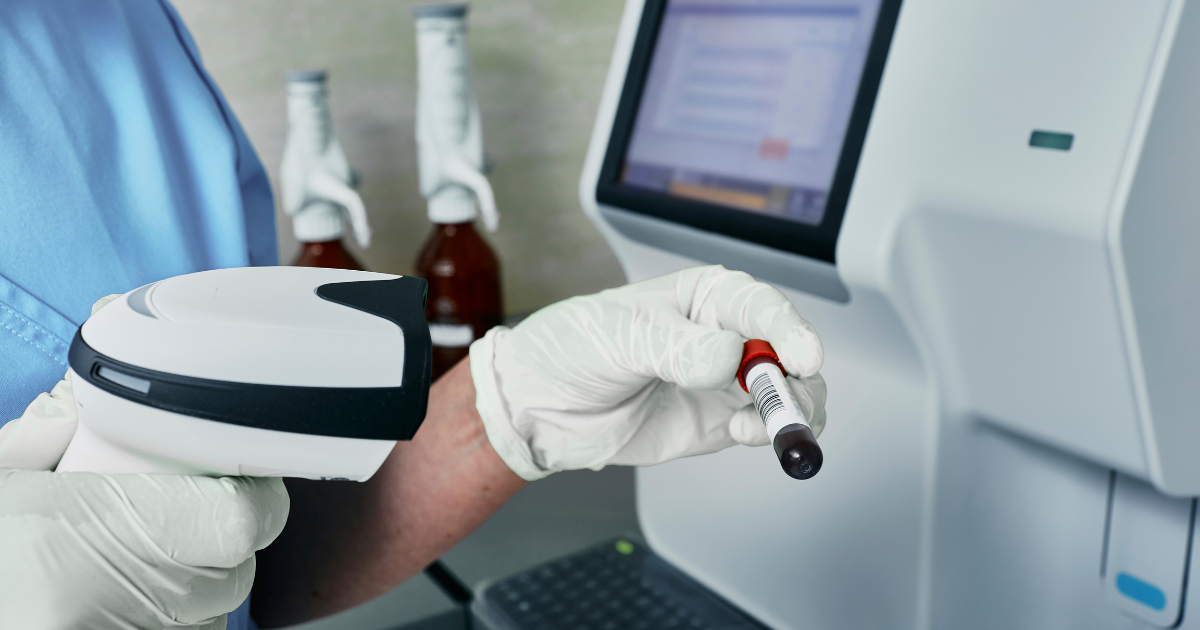 laboratory technician scanning barcode sample in tracking system workflow